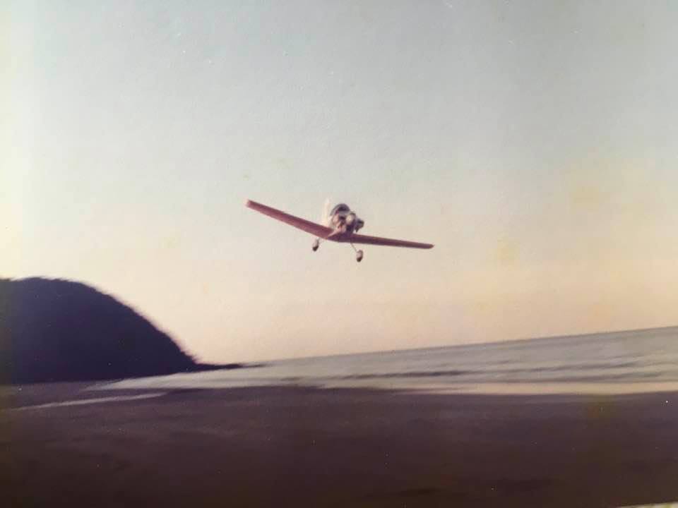 Plane at Cow Bay Beach in the 80's by Dman Dan